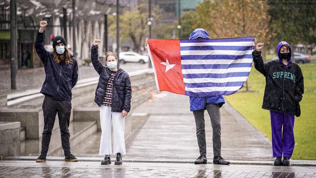 The Black Lives Matter protest in Adelaide in the rain on Saturday. Picture: Mike Burton