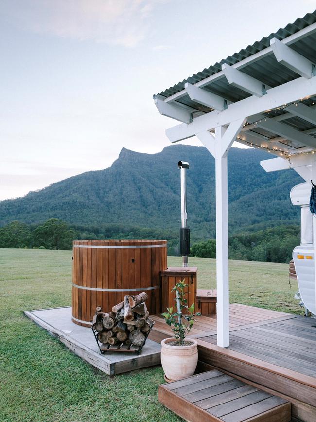 With a stylish caravan, hot tub and chef-prepared meals, Steviestay is a next level glamping option in Pumpenbil, NSW.