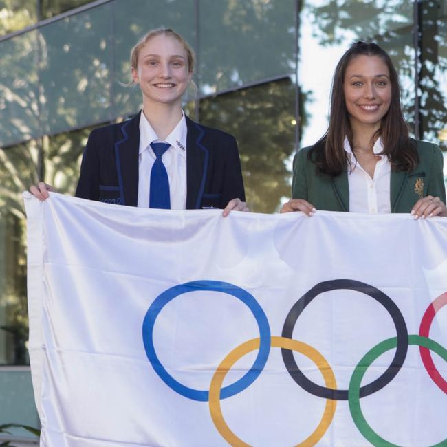 Elilzabeth Moss with Olympian was presented with an Olympic flag at Brisbane Girls Grammar earlier in the year by Olia Burtaev.