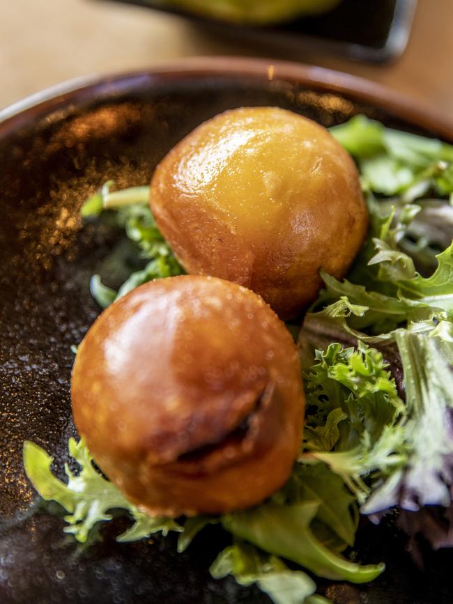 Tonkotsu’s crunchy Pumpkin buns are filled with sweet black beans. Picture: EDDIE SAFARIK