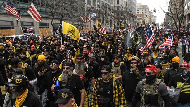 Members of the Proud Boys march towards Freedom Plaza during a protest on December 12 in Washington, DC. Picture: Getty Images