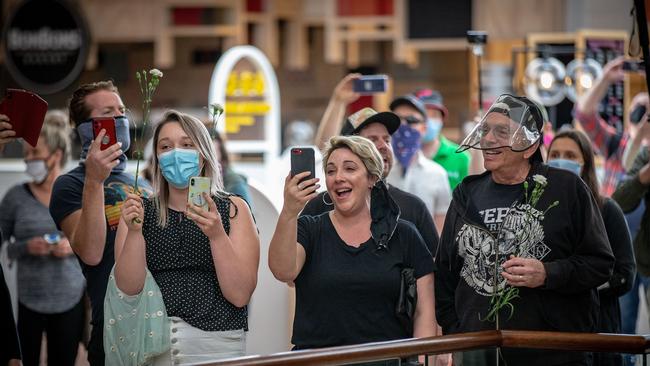 The demonstrators sang a song outside a supermarket. Picture: Darrian Traynor/Getty Images