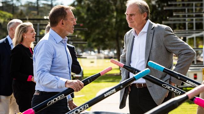 Tony Abbott, with Bridget McKenzie behind him, talks to Mosman Rowing Club former president Bryan Weir at the announcement of the gran. Picture: AAP