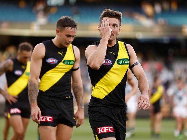 Liam Baker of the Tigers looks dejected after a loss after his side’s loss to the Power. Picture: Michael Willson/AFL Photos via Getty Images.