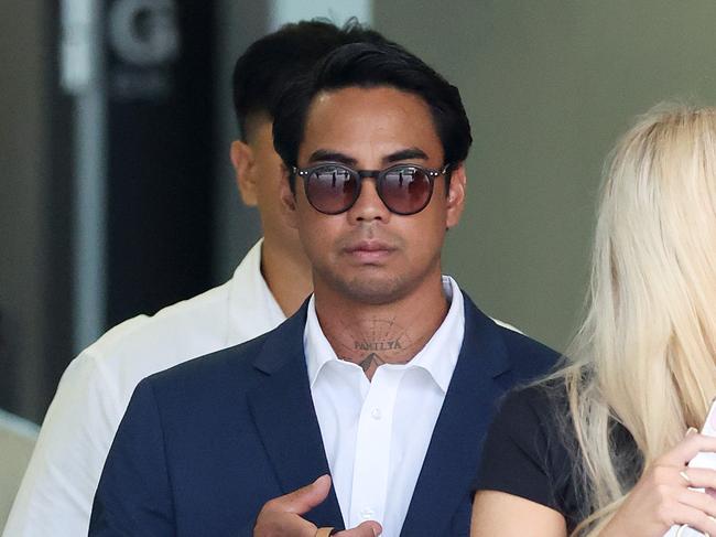 Christian Bong Collado (centre) leaving the Supreme Court, Brisbane. Picture: Liam Kidston