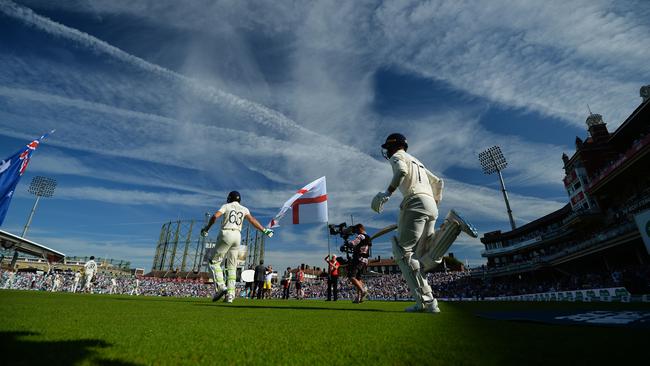 England head out onto the field on day two. Picture: AFP