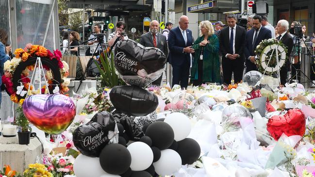 Mayor of Waverley Paula Masselos, Mayor of Hornsby Philip Ruddock, Lord Mayor of Parramatta Pierre Esber, Mayor of St Georges River Council Sam Elnir, Mayor of Liverpool Ned Mannoun and Deputy Mayor of Blacktown Chris Quilkey gather to pay respects at Bondi Junction on Wednesday. Picture: NCA Newswire / Gaye Gerard