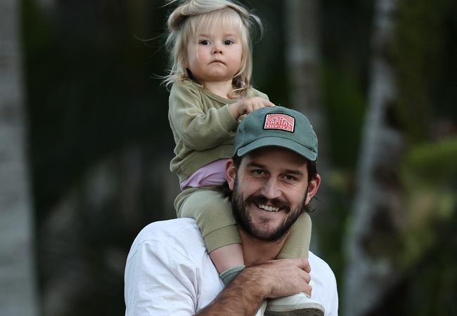 Josh Bruce with daughter Poppy at the Gold Coasr hub. Picture: Michael Klein