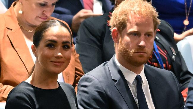 (FILES) Prince Harry (R) and Meghan Markle (L), the Duke and Duchess of Sussex, attend the 2020 UN Nelson Mandela Prize award ceremony at the United Nations in New York on July 18, 2022. A multi-million-dollar deal between a media group run by Britain's Prince Harry and his wife Meghan Markle, and streaming giant Spotify is to end, a report said June 15, 2023. (Photo by TIMOTHY A. CLARY / AFP)