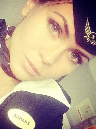 Mystery beauty... An unidentified Aeroflot flight attendant posted this selfie with the caption, "Sometimes it happens..." Picture: Instagram