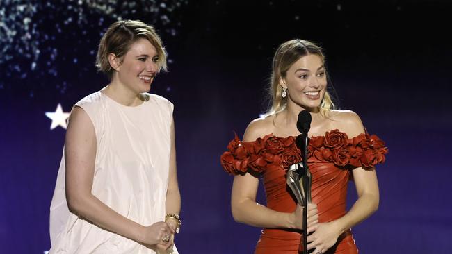 Greta Gerwig and Margot Robbie accept the Best Comedy Award for "Barbie" onstage during the 29th Annual Critics Choice Awards. Picture: Kevin Winter/Getty Images for Critics Choice Association