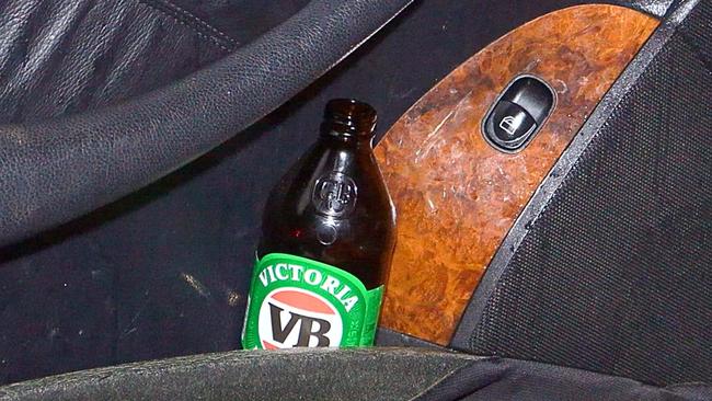 A VB bottle found in the Mercedes Benz. Picture: Frank Redward