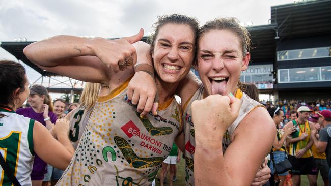 PINT celebrates Jasmyn Hewett and Carly Remmos in the 2023-24 NTFL Women's Grand Final between PINT and St Mary's. Picture: Pema Tamang Pakhrin