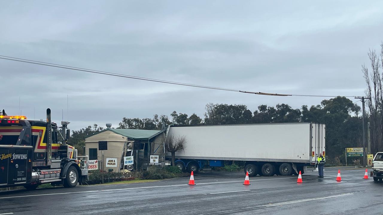 A stretch of Alexandria Drive is down to one lane after a truck crashed into Enchanted Garden Nursery. Photo/Jessica Paul