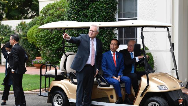 Scott Morrison points the way as Joko Widodo and Governor General David Hurley go kangaroo spotting at Yarralumla. Picture: Supplied