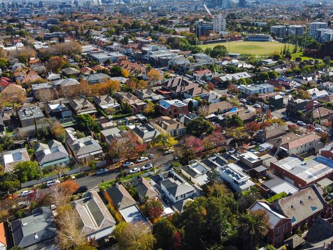 Aerial view of houses in Armadale, looking towards the Melbourne city skyline.