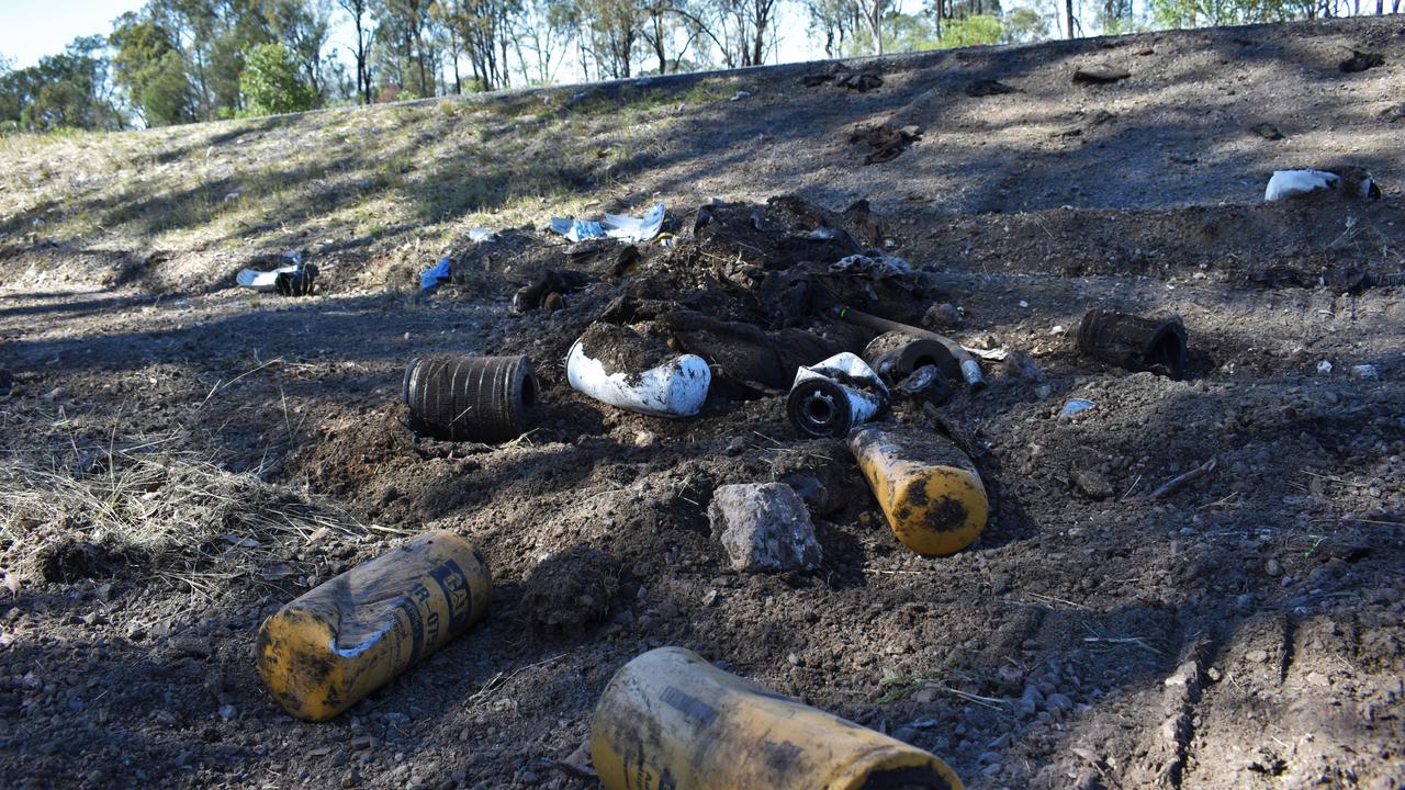 The morning after the crash foul smelling oily debris littered the roadside. Picture: Peta McEachern