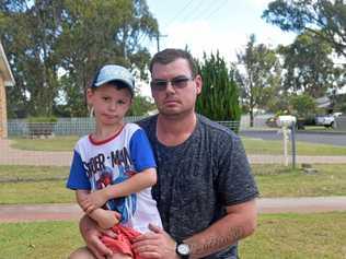 DEVASTATED: Five-year-old Saxson Warner and his dad, Jarryd, were targeted by thieves on Christmas Day. Picture: Sean Teuma