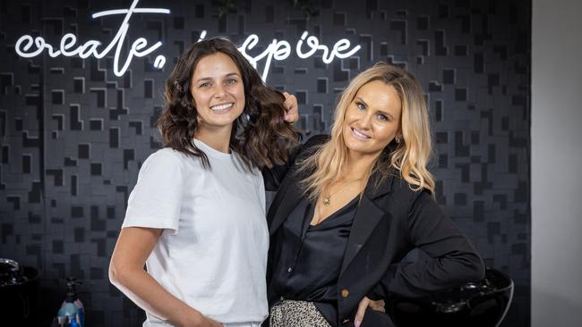 Kellie Finlayson (left) and owner of Coil Hair Studio Cole Tsakmakis. Picture: Emma Brasier