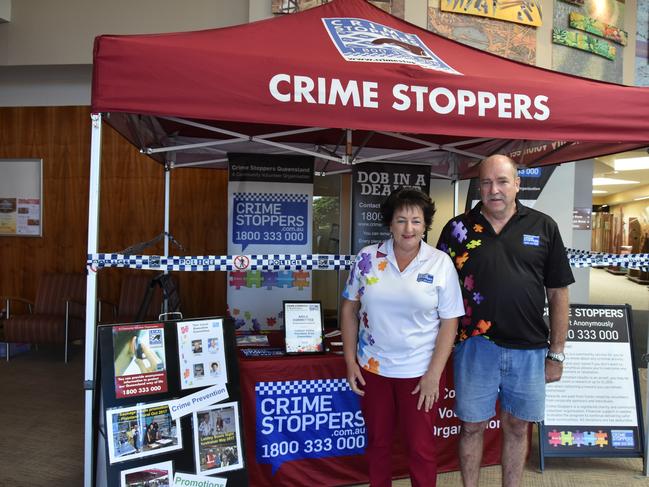 Lockyer Valley Crime Stoppers Area Committee Vice Chairperson Greg Steffens and Treasurer Janice Holstein at the stand the committee set up in preparation for National Crimestoppers Day on May 21, at the Lockyer Valley Cultural Centre in Gatton.