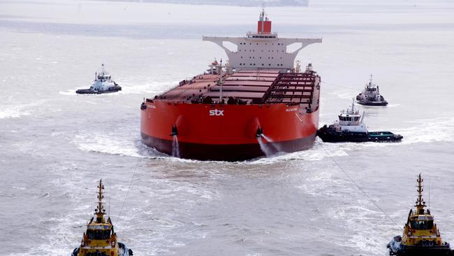 The ore carrier Vale Beijing is towed away from the Ponta da Madeira terminal, in Sao Luiz, northern Brazil.