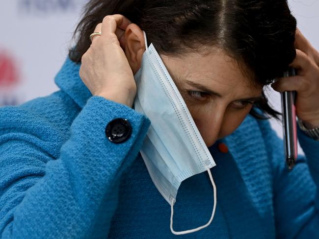 NSW Premier Gladys Berejiklian puts her face mask on after speaking to the media. Picture: NCA NewsWire/Bianca De Marchi