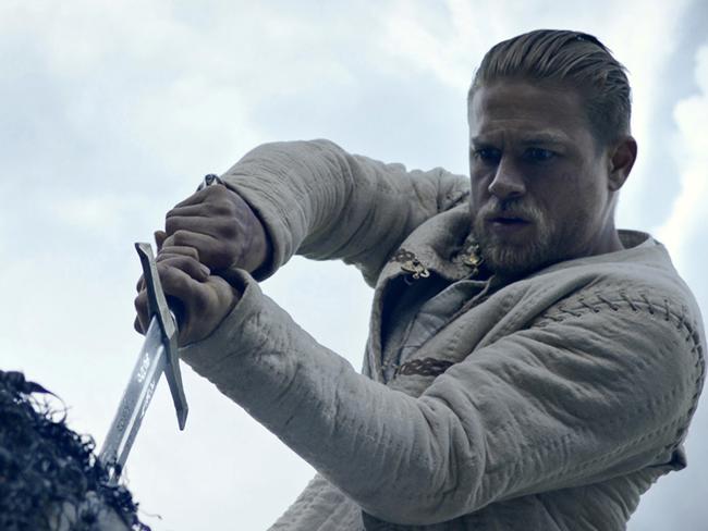 This image released by Warner Bros. Pictures shows Charlie Hunnam in a scene from, "King Arthur: Legend of the Sword." (Warner Bros. Pictures via AP)