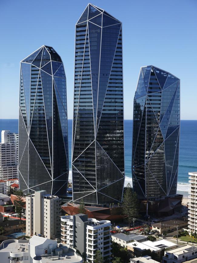 The three glimmering towers on the Surfers Paradise skyline are very hard to miss – unlike if you’re looking for marketing of the luxury units. Picture Glenn Hampson