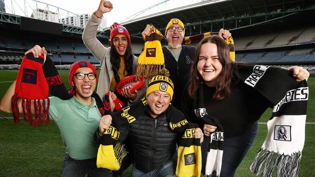 Footy fans Anthony Lo (Melbourne), Shabnam Gill (Western bulldogs), Jay Doyle (Richmond), Andrew Krein (Hawthorn) and Anneka Smith (Collingwood) at Marvel Stadium. Picture: Michael Klein