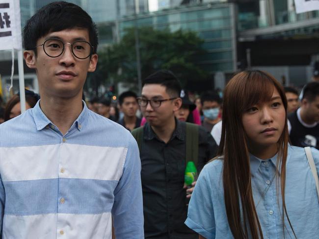 Baggio Leung and Yau Wai-ching during Saturday’s more energetic protests. Picture: Isaac Lawrence/AFP