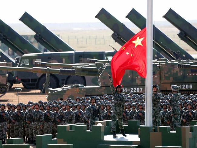 China has been building up its military while Donald Trump has been pursuing an American first policy. Picture: Pang Xinglei/Xinhua/AP