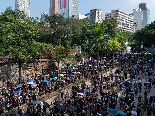 Demonstrators march on a street as they take part in a rally at Tsim Sha Tsui district in Hong Kong, China. Picture: Getty Images