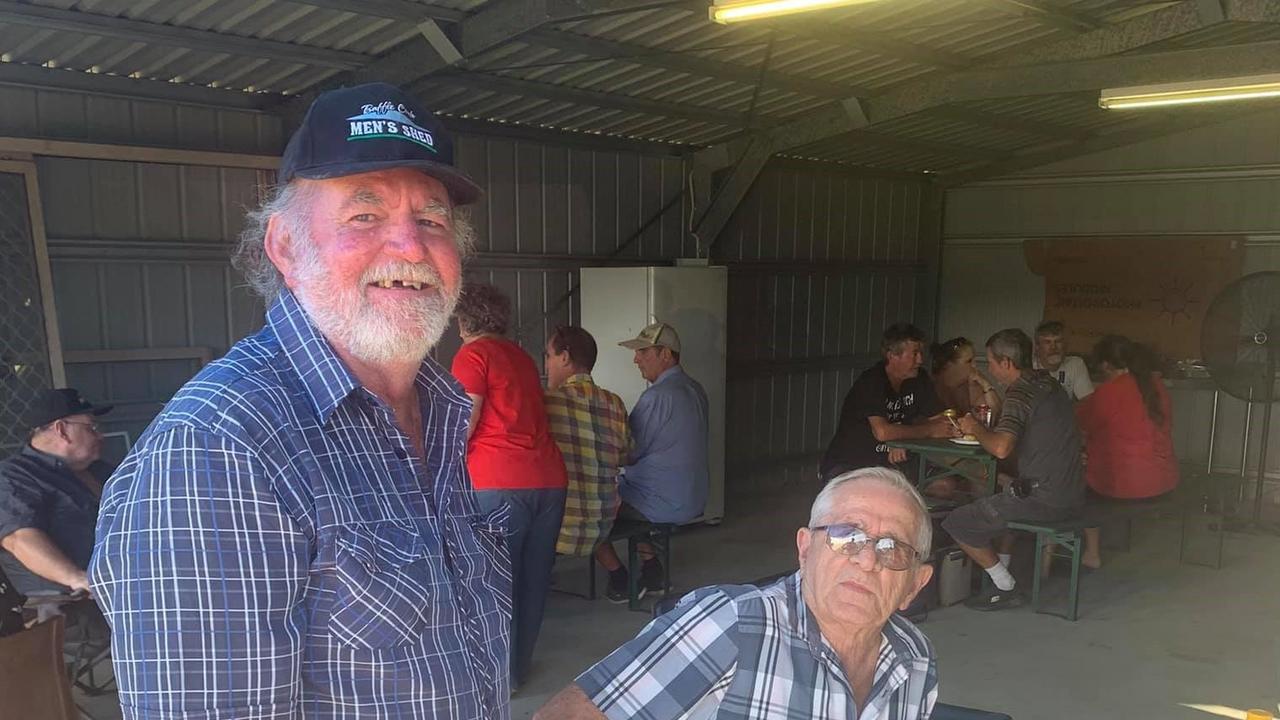 Baffle Creek Men's Shed members together in their current premises, which will be replaced with a new 20 x 12 metre shed when approved by council.