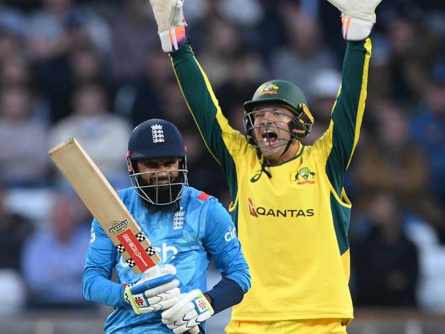 LEEDS, ENGLAND - SEPTEMBER 21: England batsman Adil Rashid reacts after being given out lbw to Glenn Maxwell as Alex Carey appeals during the 2nd Metro Bank ODI between England and Australia at Headingley on September 21, 2024 in Leeds, England.  (Photo by Stu Forster/Getty Images)