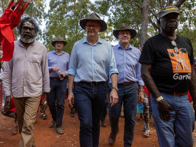 EAST ARNHEM, AUSTRALIA - JULY 29: Australian Prime Minister Anthony Albanese (C) arrives for the Garma Festival at Gulkula on July 29, 2022 in East Arnhem, Australia.  The annual Garma festival is held at Gulkula, a significant ceremonial site for the Yolngu people of northeast Arnhem Land about 40km from Nhulunbuy on the Gove peninsula in East Arnhem. The festival is a celebration of Yolngu culture aimed at sharing culture and knowledge which also brings politicians and Indigenous leaders together to discuss issues facing Australia's Aboriginal and Torres Strait Islander people. This year is the first time the festival has been held since 2019 following a two-year absence due to the COVID-19 pandemic. (Photo by Tamati Smith/Getty Images)