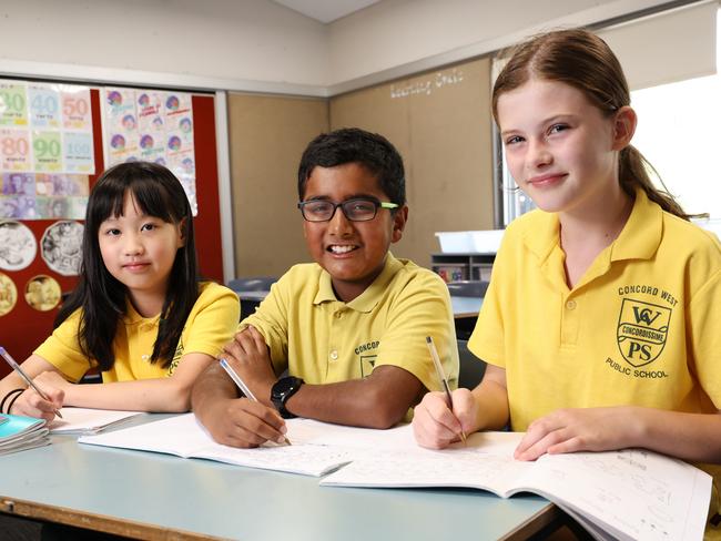 DAILY TELEGRAPH 12TH DECEMBER 2023Pictured at Concord West Public School, are students Jesslyn Wijaya , Shohaan Sengupta and Sophia Daniel.Concord West Public School was a top performer in the 2023 NAPLAN exams. Students have higher-than-average maths skills.Picture: Richard Dobson