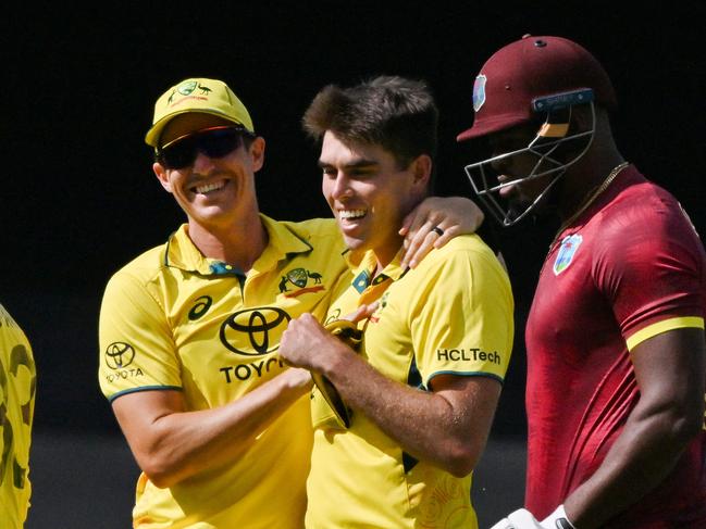 Australian paceman Xavier Bartlett celebrates his wicket of West Indies’ batsman Alzarri Joseph during the third one-day international cricket match Photo by Saeed KHAN / AFP