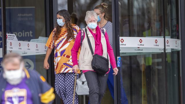 People wear masks outside Melbourne’s The Alfred Hospital. Picture: Wayne Taylor/NewsWire