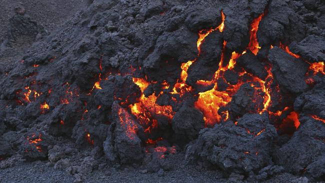 Glowing molten volcanic rock of Eyjafjallajokull Fimmvorduhals Iceland