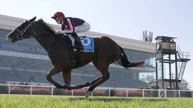 Ben Allen rides Waging War to victory in race 2, IRT Vobis Gold Mile, during Caulfield Owners and Breeders Race Day at Caulfield Racecourse in Melbourne, Saturday, April 21, 2018. (AAP Image/George Salpigtidis) NO ARCHIVING, EDITORIAL USE ONLY