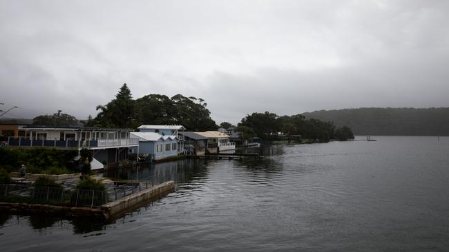 Lakeside houses and piers were partly submerged on March 3 as heavy rains swells lakes and rivers in Burrill Lake. Picture: Nathan Schmidt