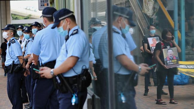 Police gather to keep an eye on pro-democracy activists in Hong Kong. Picture: AFP