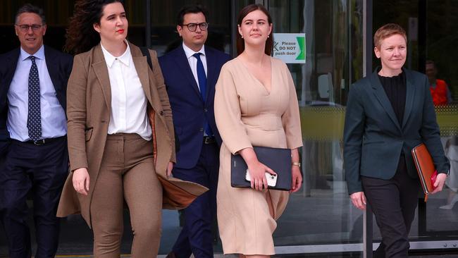 Emma Webster, Brittany Higgins and Heidi Yates leaving the ACT Supreme Court during Bruce Lehrmann’s trial in October 2022. Photo: David Gray/AFP.