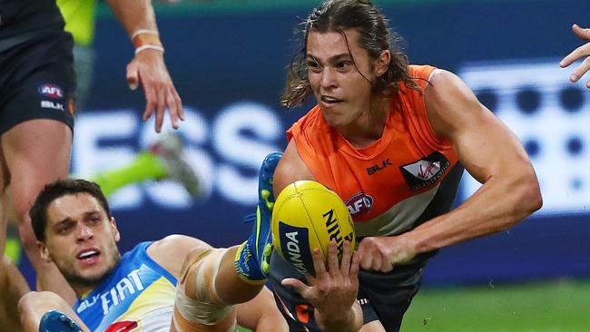 Jack Steele fires out a handball during his time with GWS. Picture. Phil Hillyard