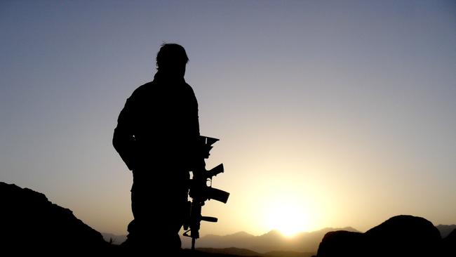 An Australian Special Operations Task Group soldiers observing the valley during the Shah Wali Kot Offensive. The soldier is not accused of any wrongdoing. Picture: Department of Defence