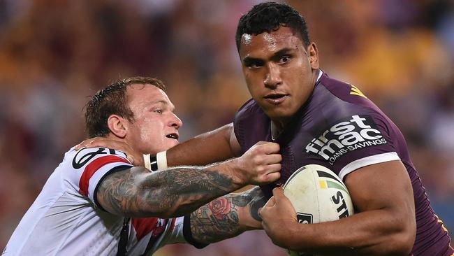 BRISBANE, AUSTRALIA — SEPTEMBER 01: Tevita Pangai Junior of the Broncos is tackled by Jake Friend of the Roosters during the round 26 NRL match between the Brisbane Broncos and the Sydney Roosters at Suncorp Stadium on September 1, 2016 in Brisbane, Australia. (Photo by Matt Roberts/Getty Images)