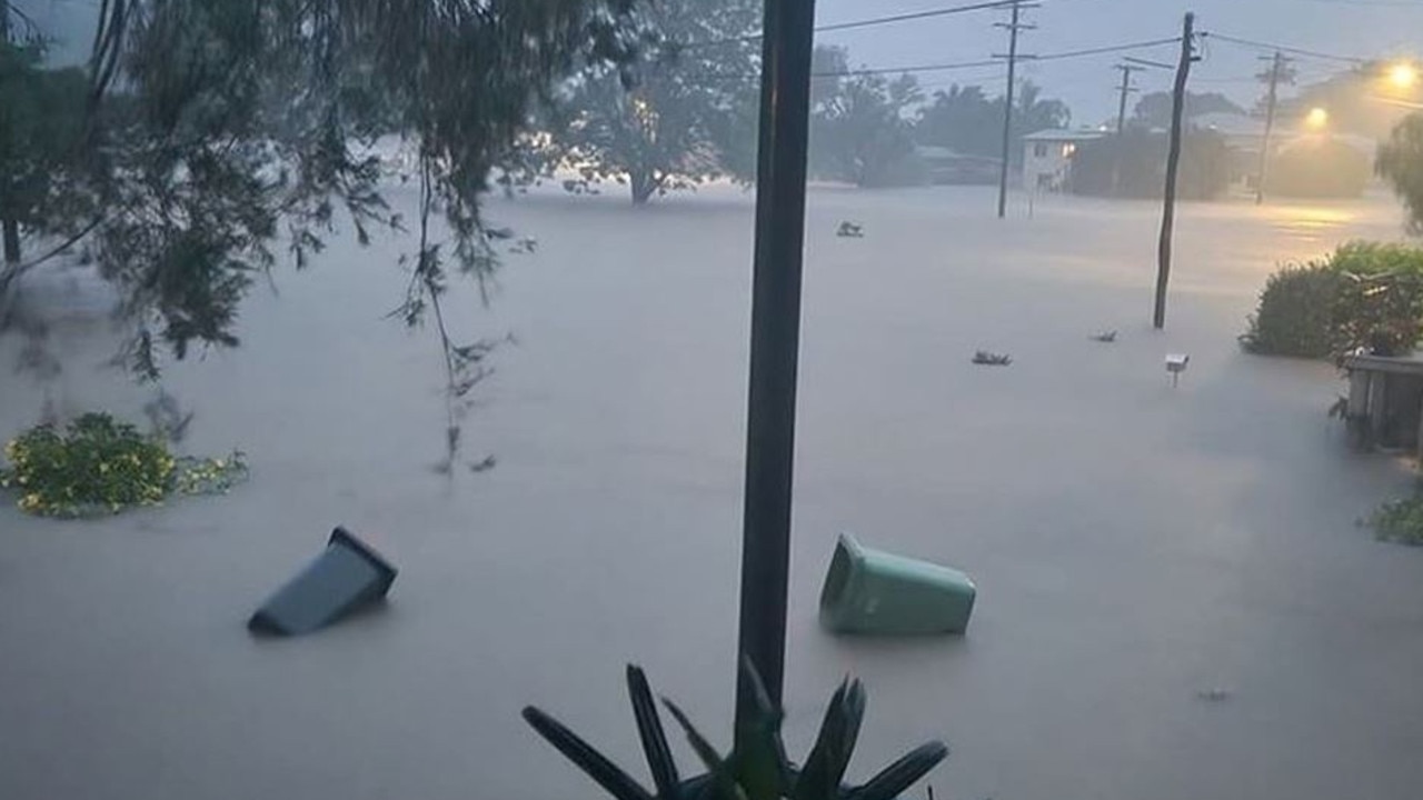 A torrent of floodwaters inundate Ingham late Saturday. Picture: Facebook