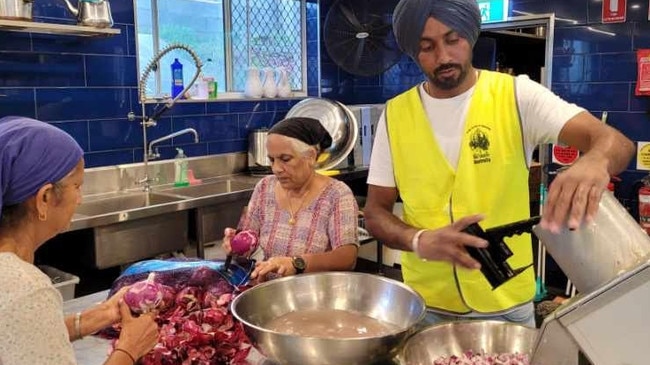 Sikh community members prepare free meals for the wider community in need. Picture: Jaswinder Singh