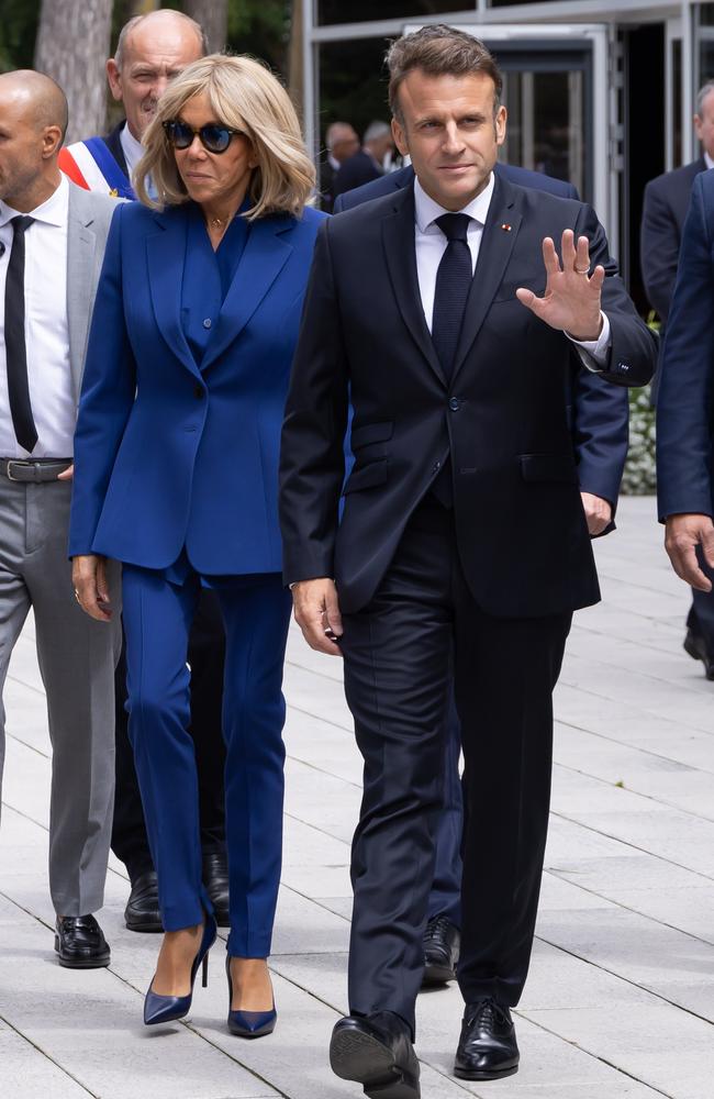 French President Emmanuel Macron and his wife Brigitte Macron leave the voting station on July 7, 2024 in Le Touquet-Paris-Plage, France. Picture: Getty Images