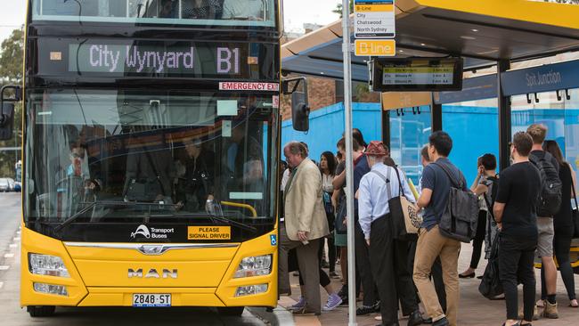 Commuters getting onboard a B-Line bus. Picture: (AAP Image / Julian Andrews).